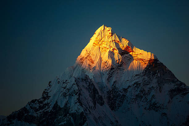 Beautiful landscape of Himalayas mountains Ama Dablam peak at sunset. mountain peak stock pictures, royalty-free photos & images
