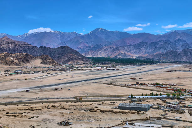 Beautiful landscape with snow capped Himalaya mountains and  a Leh airport in Ladakh, India . Beautiful landscape with snow capped Himalaya mountains and  a Leh airport in Ladakh, India . leh district stock pictures, royalty-free photos & images