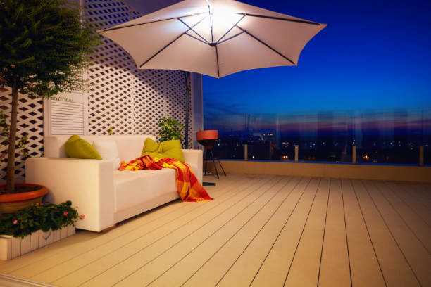 A beautiful modern rooftop patio, with a moveable umbrella