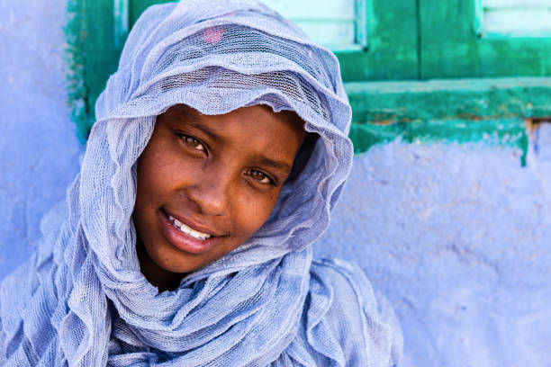 Beautiful Muslim girl in Southern Egypt Beautiful Muslim girl in Nubian Village near Aswan, Southern Egypt, Africa aswan egypt stock pictures, royalty-free photos & images