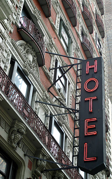 beautiful old hotel with neon sign in New York City stock photo