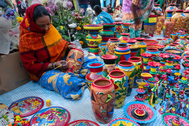 Beautiful painted terracotta pots, handicrafts for sale, India stock photo