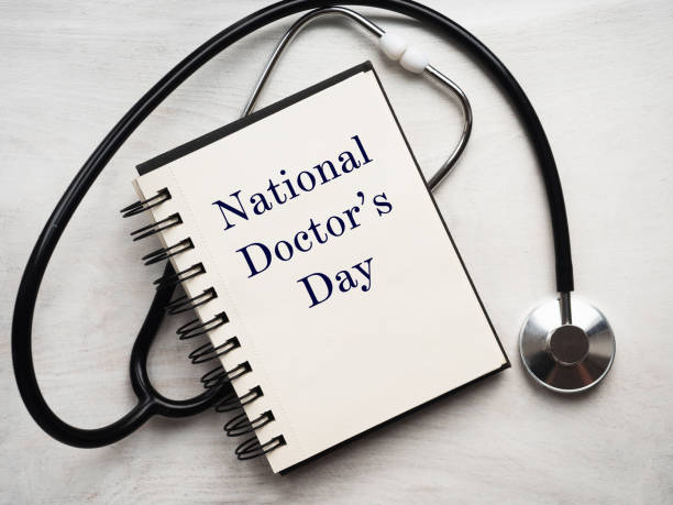 Beautiful pattern in the shape of hearts Happy national Doctor's Day. Beautiful card. Isolated background, wooden surface. Congratulations to family, relatives, friends and colleagues happy doctors day stock pictures, royalty-free photos & images