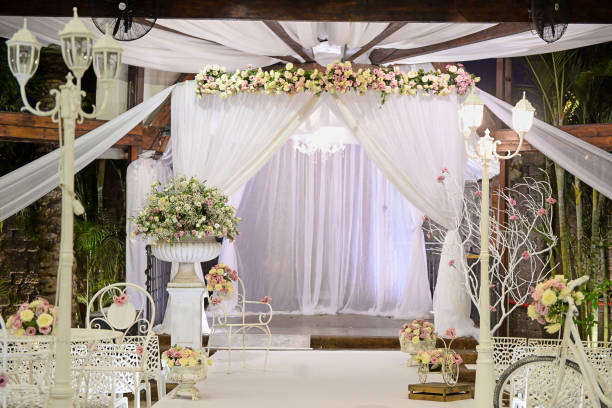 Beautiful photo of the Jewish Hupa , wedding putdoor . Beautiful photo of the Jewish Hupa , wedding putdoor .Beautifully registered Huppa with a set of flowers. chupah stock pictures, royalty-free photos & images