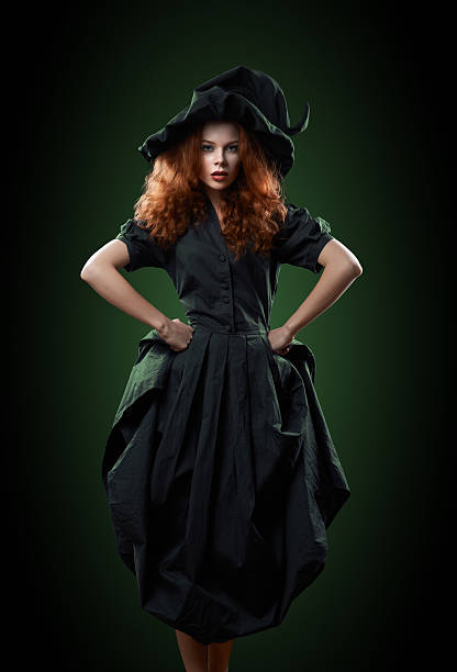 beautiful red-haired girl in  costumes witch beautiful red-haired girl in green costumes witch ugly skinny women stock pictures, royalty-free photos & images