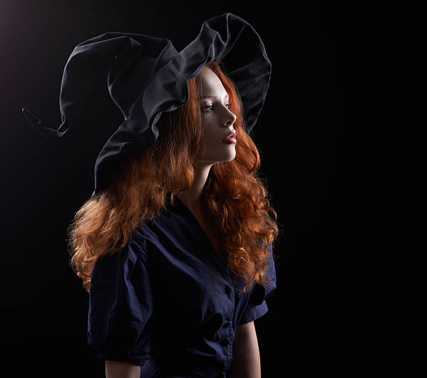 beautiful red-haired witch in the dark Young beautiful red-haired witch in the dark ugly skinny women stock pictures, royalty-free photos & images