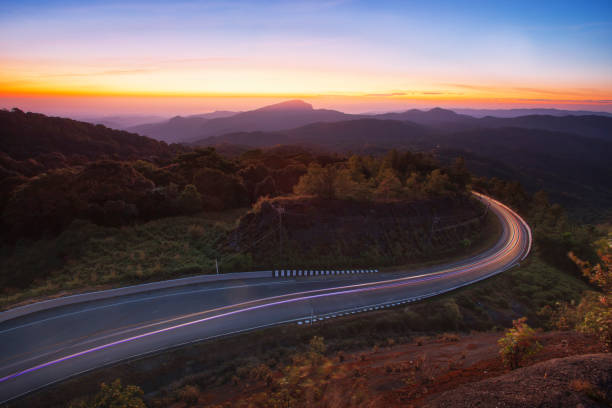 Beautiful road with morning cloud at Doi Inthanon Chiangmai, Thailand.  travel stock pictures, royalty-free photos & images