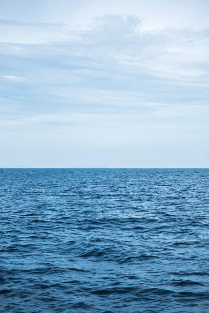 Beautiful sky and blue ocean stock photo