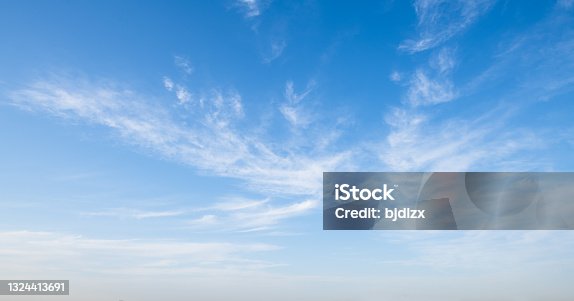 istock Beautiful sky with white clouds 1324413691