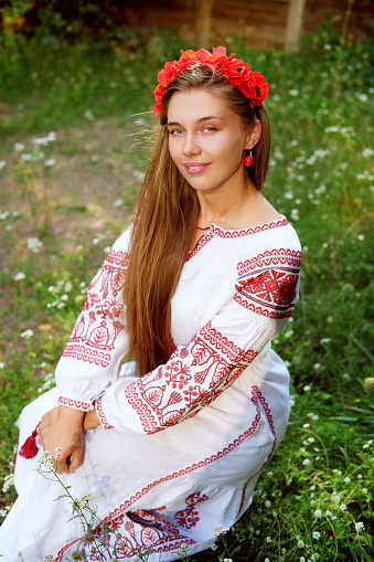 Beautiful Slavonic Girl With Long Blond Hair And Blue Eyes With Flower ...