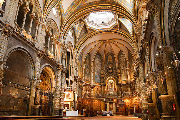 Beautiful Spanish Basilica at the Montserrat Monastery Basilica at the Montserrat Monastery, a spectacularly beautiful Benedictine Abbey high up in the mountains near Barcelona, Catalonia, Spain. abbey monastery stock pictures, royalty-free photos & images