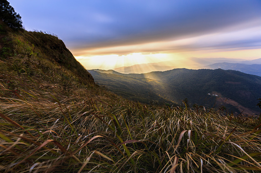 Beautiful Sunlight Rays on mountain with Landscape Photographer