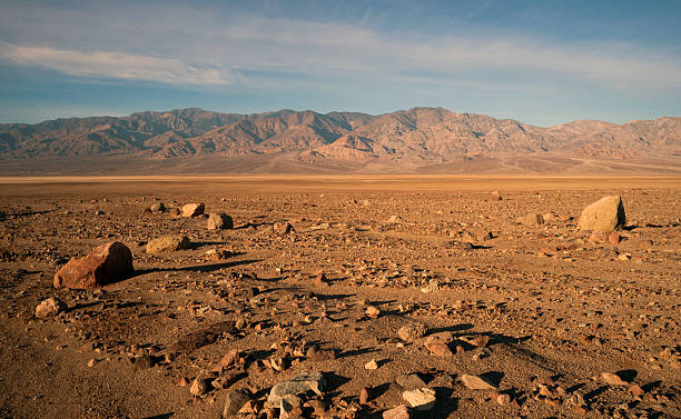 Beautiful Sunrise Death Valley National Park The sun rises to light the dry basin in Death Valley desert area stock pictures, royalty-free photos & images