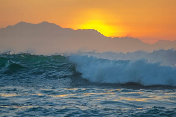 Beautiful sunset with the view of a wild sea in the cantabrian sea of "u200b"u200bSpain. stock photo