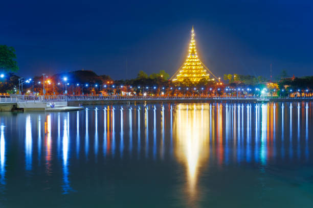 Beautiful thailand temple over bueng kaen nakhon lake in twilight at khonkaen, Thailand stock photo