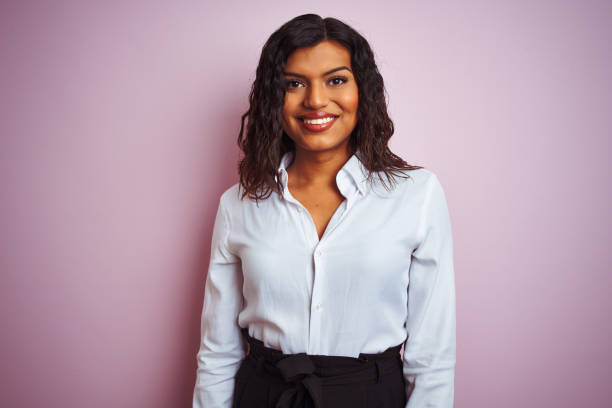 Beautiful transsexual transgender elegant businesswoman over isolated pink background with a happy and cool smile on face. Lucky person.  transgender stock pictures, royalty-free photos & images
