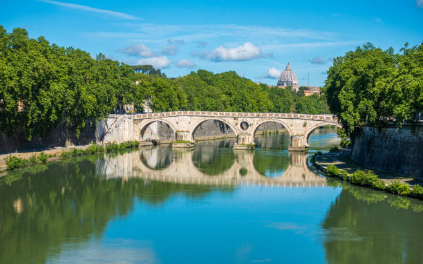 Beautiful view from Ponte Sisto in Rome, with the Saint Peters Basilica dome in the background. Italy. stock photo