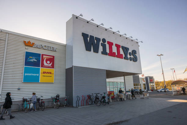 Beautiful view of facade of Willy:s supermarket with people visiting supermarket. stock photo