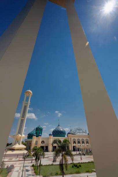 A beautiful view on bright noon at Mosque Mesjid Al Karamah at Martapura, South Borneo Indonesia with blue sky in the background stock photo