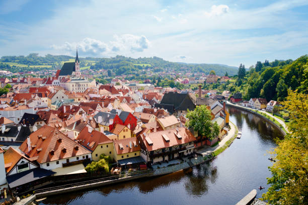 Beautiful view to church and castle in Cesky Krumlov, Czech republic. Panorama of UNESCO World Heritage Site city. Beautiful view to church and castle in Cesky Krumlov, Czech republic. Panorama of UNESCO World Heritage Site city vltava river stock pictures, royalty-free photos & images