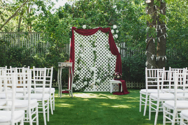 Beautiful wedding ceremony in the park on the grass. stock photo