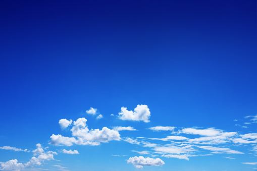 beautiful white clouds on blue sky for background and design