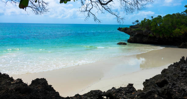 Beautiful white sand beach in the beautiful chale island near mombassa kenya stock photo