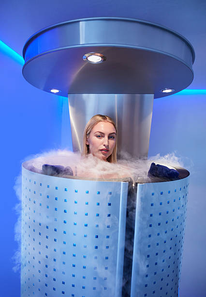 beautiful woman in a full body cryotherapy camber - ice bath bildbanksfoton och bilder