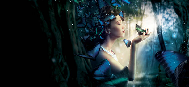 Beautiful woman in the magic forest stock photo