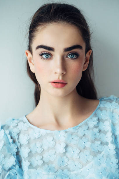 Girl with black hair and blue eyes