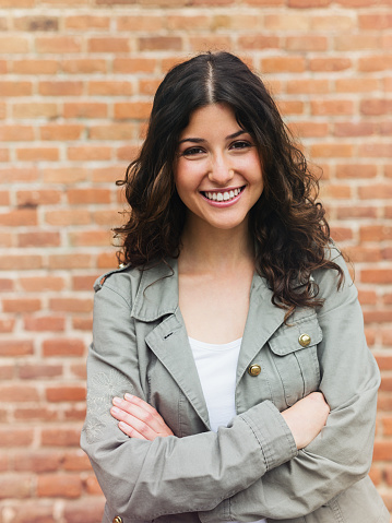 Beautiful woman smiling in the street stock photo