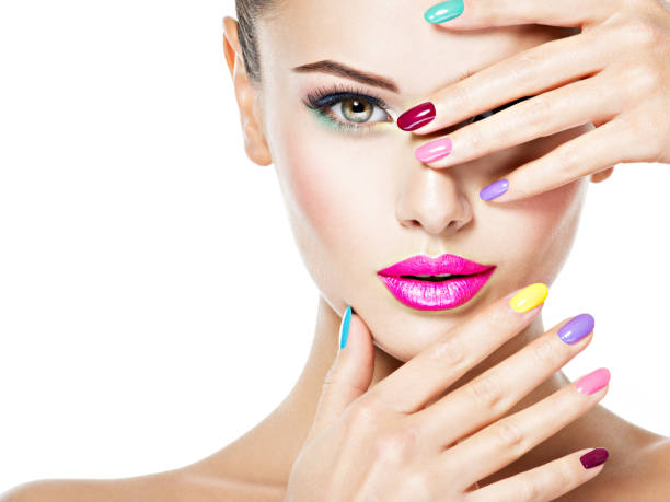 beautiful woman  with colored nails stock photo