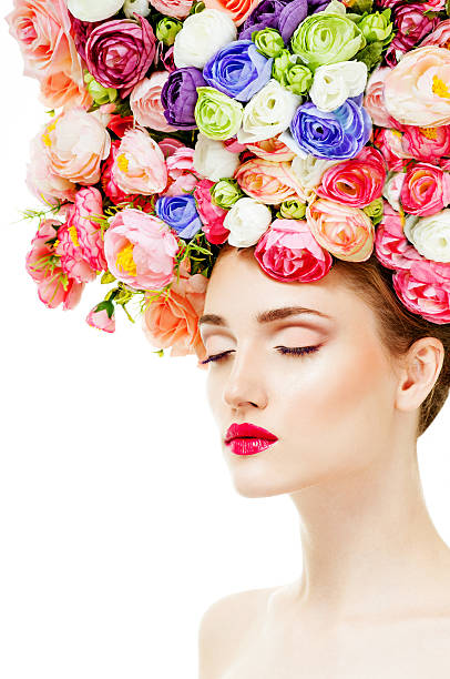 Beautiful woman with flowers in her hair. stock photo