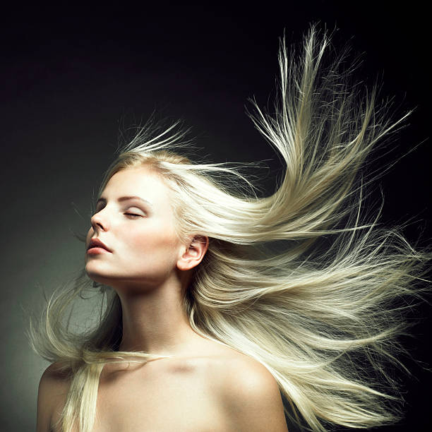 Beautiful woman with magnificent hair stock photo