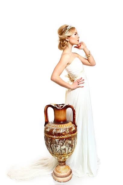 Beautiful young woman styled Greek with  amphora on white background stock photo