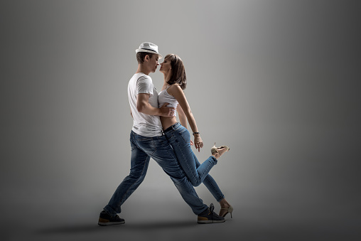 Beauty Couple Dancing Social Danse On Grey Background Stock Photo ...