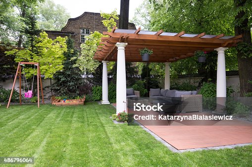 istock Beauty garden with modern gazebo 486796064