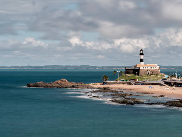 Beauty of the Lighthouse on the coast of Itapuã Beach, Salvador, Bahia, Brazil stock photo