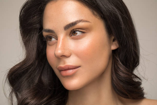 Beauty portrait of young woman Close up studio shot of a beautiful natural blonde woman with freckles skin. beautiful hair stock pictures, royalty-free photos & images