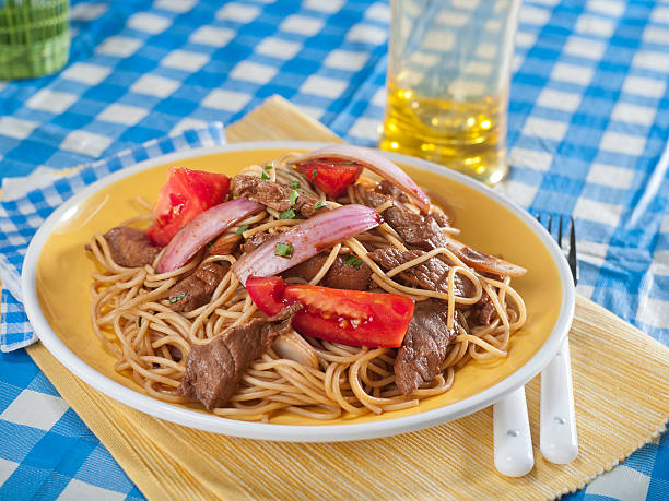 Beef and noodle stir fry, Tallarin Saltado, typical Peruvian dish stock photo