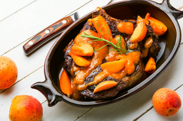 Beef in apricot marinade stock photo