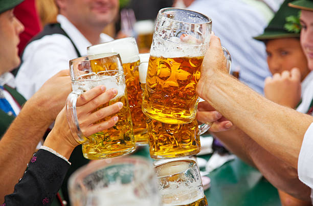 Beer at Oktoberfest in Munich, Germany Beer at Oktoberfest in Munich, Germany german culture stock pictures, royalty-free photos & images