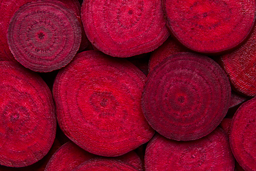 Slices of  fresh organic beetroot for background