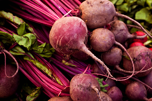 Beets at the farmers market, macro, shallow focus.