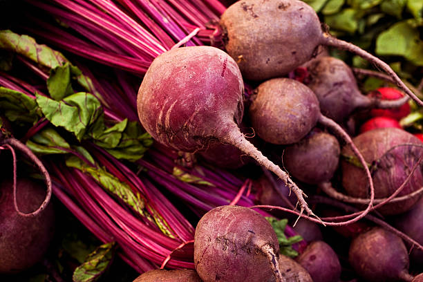 Beets Beets at the farmers market, macro, shallow focus. beet stock pictures, royalty-free photos & images
