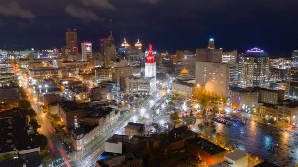 Before Sunrise Night Time Buffalo New York Downtown City Skyline The buildings are illuminated before sunrise in the urban core of Buffalo New York buffalo stock pictures, royalty-free photos & images