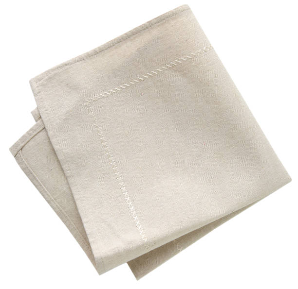 Beige kitchen cloth isolated top view. Top view folded kitchen towel isolated.Beige cloth. napkin stock pictures, royalty-free photos & images