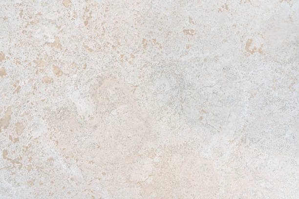 beige kalksteen vergelijkbaar met marmer natuurlijk oppervlak of textuur voor vloer of badkamer - kalksteen stockfoto's en -beelden