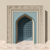 istock Beige Mosque Arch With Blue Floral And Geometrical Pattern, Stone Carving And Openwork Window. Floral Pattern On The Marble Tiles Floor 1300535520