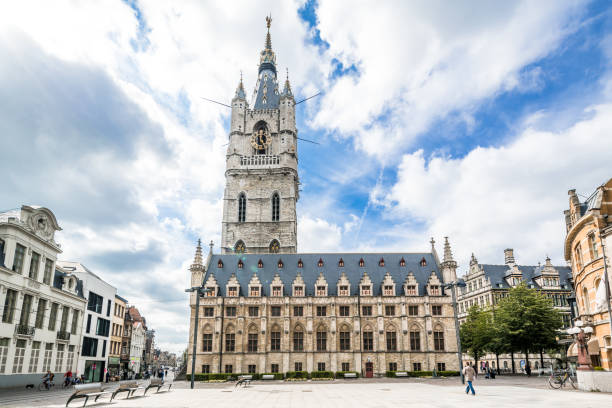 Belfry of Ghent, bell tower, in Belgium Belfry of Ghent, bell tower, next to the Cloth Hall in the medieval city of Ghent, Belgium bell tower tower stock pictures, royalty-free photos & images
